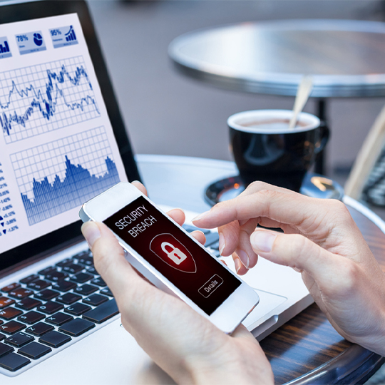 hands working with laptop